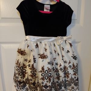 Black velvet and gold dress